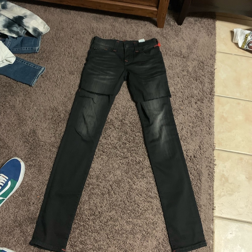 Red stitching true religions